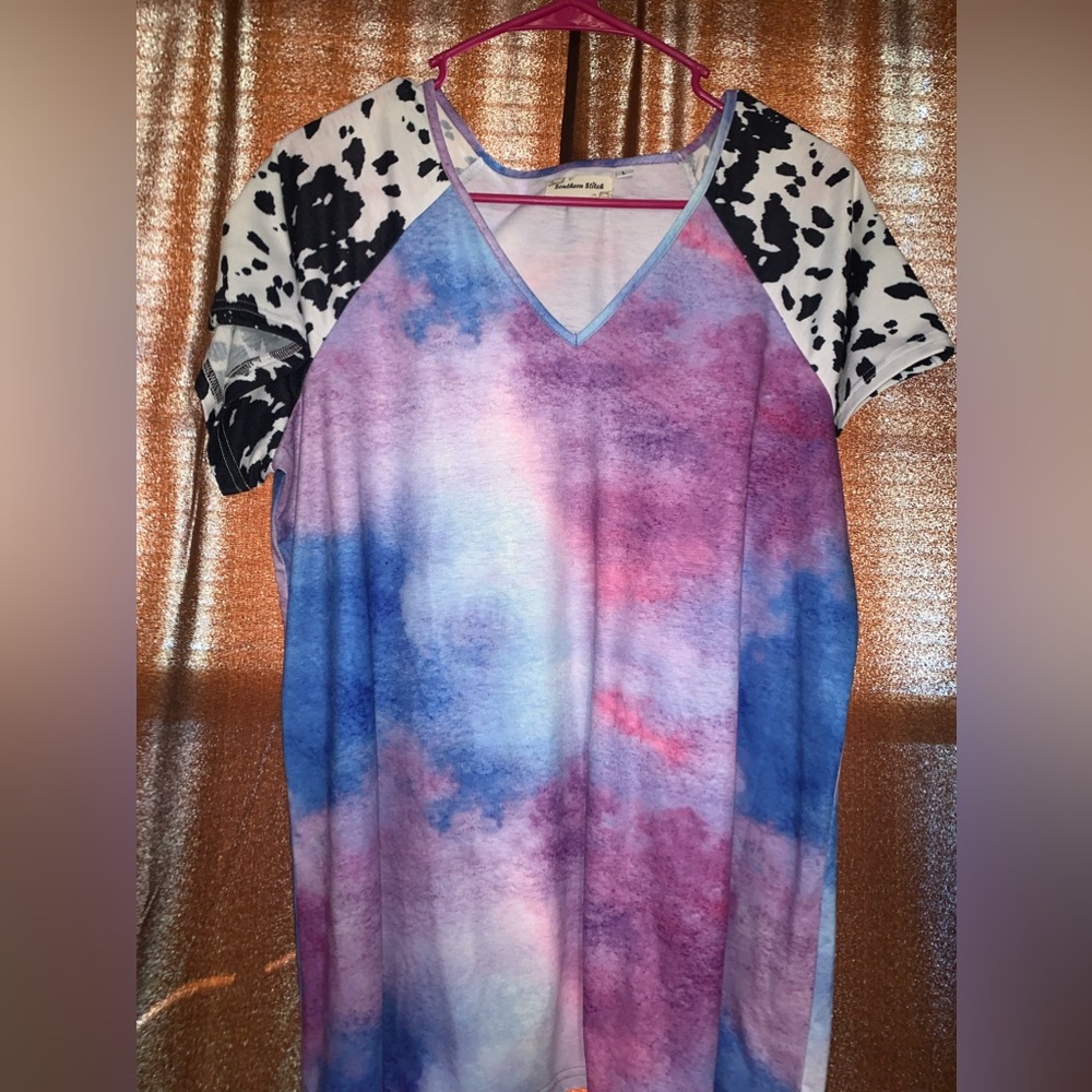 Woman's Southern Stitch, blue and purple top with cow print sleeves. Size L